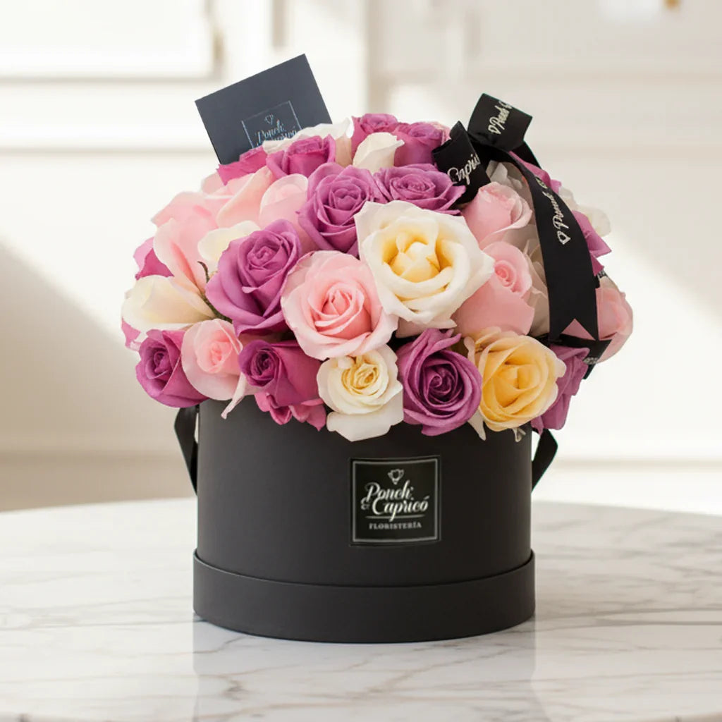 Arreglo floral de 60 a 80 Rosas Lila, Rosadas y Crema en Caja (Domo)