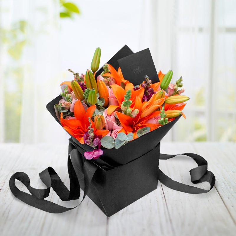 Lillies naranja, rosas y boca de dragón