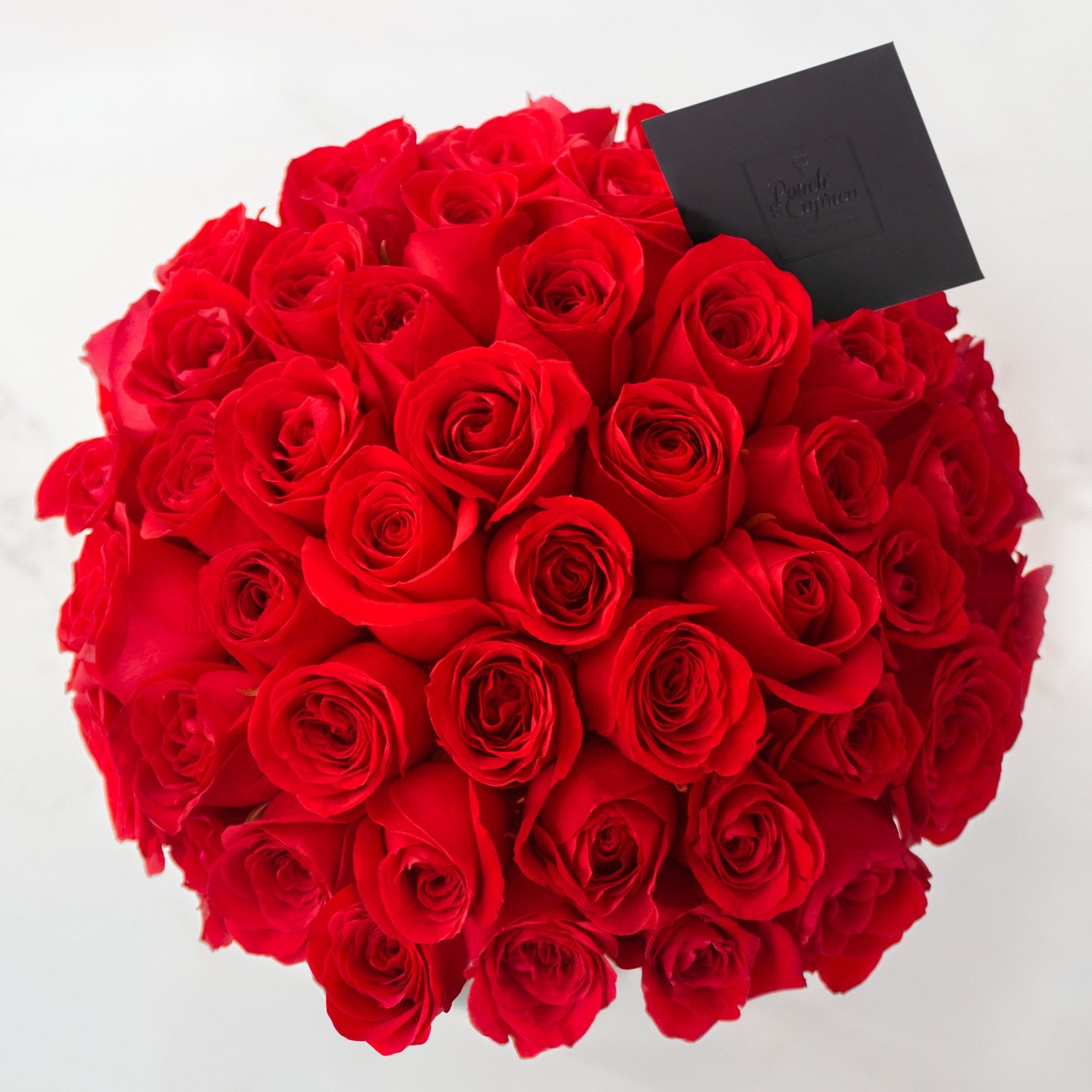 50 rosas (color de rosas a elegir) en florero de vidrio | Globos y Regalos Teleglobos.com.mx.