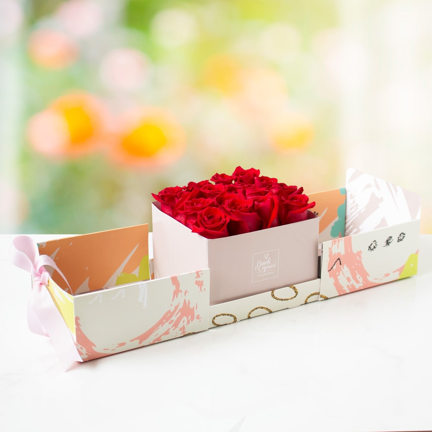 Caja Sorpresa con 16 rosas -color a elegir- | Globos y Regalos Teleglobos.com.mx.